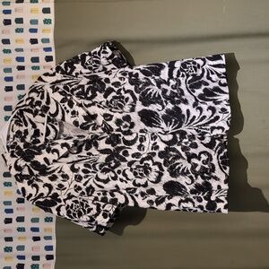 Short sleeved, unlined blazer